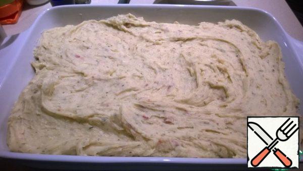 When the puree becomes homogeneous, transfer it to a baking dish.
