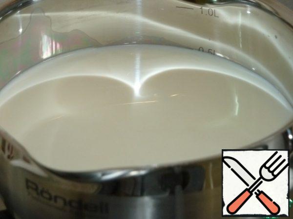 Boil milk with sugar, add butter and chocolate broken into pieces in boiling milk.
Cook, stirring, until the chocolate is completely melted.