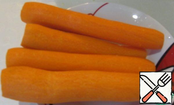Peel the carrots.