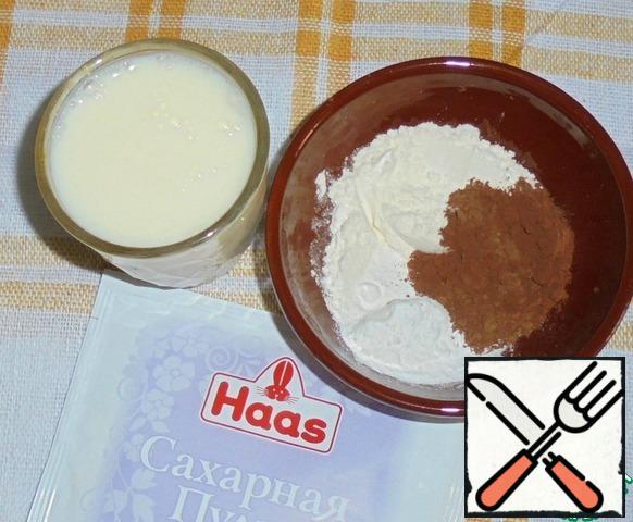 For chocolate pudding take powdered sugar, cocoa powder, flour and milk.
Mix first dry ingredients, and then dilute them in milk.