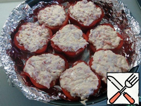 Put the resulting mixture on the stuffed peppers.

