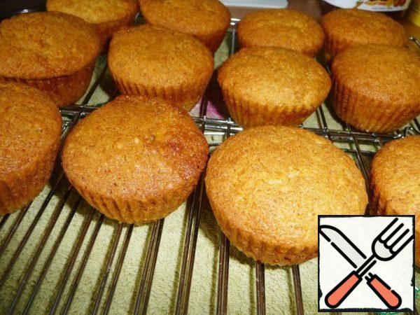 The cooled muffins to release from molds.