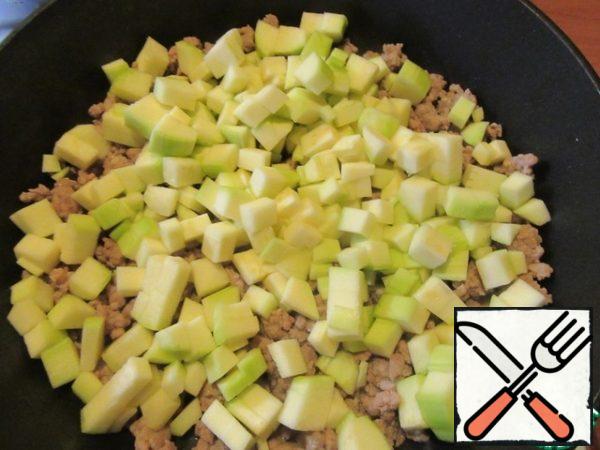 Add the zucchini and simmer for 5 minutes.
