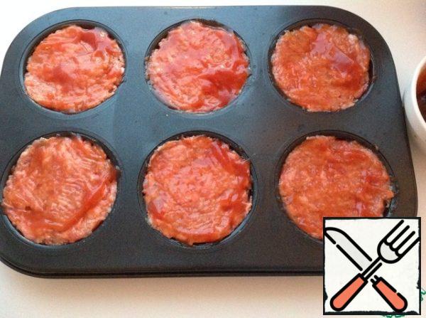 Smear half of the ketchup mixture on meat muffins. Bake until tender, about 35 minutes.
