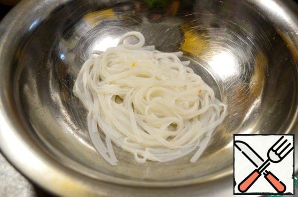 Noodles are prepared in the way indicated on the package.
