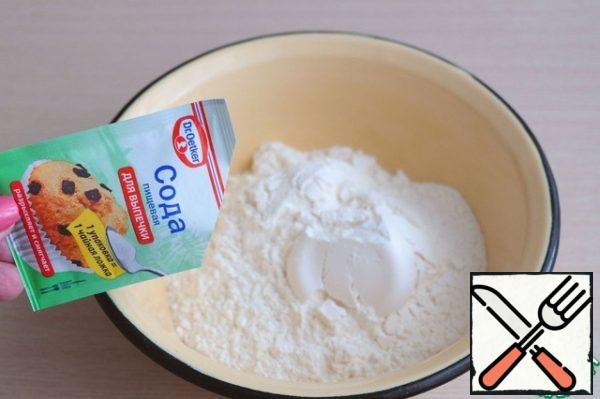 In a bowl, combine all the dry ingredients: flour (2 cups), soda (1 tsp), salt (1/3 tsp).