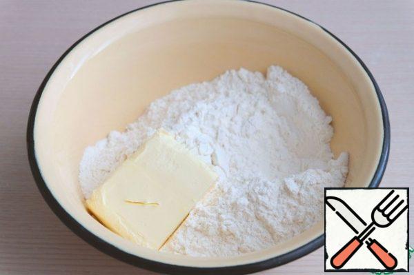 In flour mixture add softened butter (70 gr.)