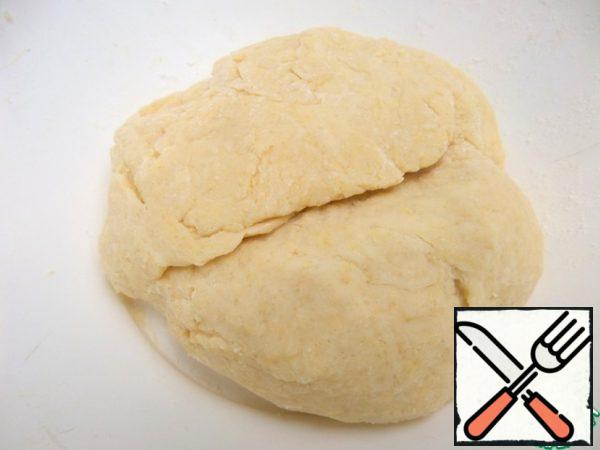 Knead an elastic dough bun, cover and set aside.
