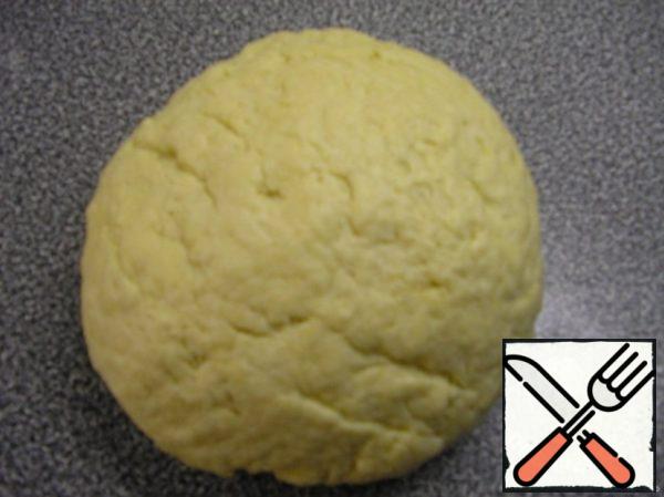 Mix in one Cup all the ingredients and knead a smooth dough.