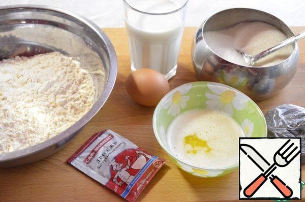 The first step is to prepare the ingredients. Heat milk to a warm state. Melt butter.