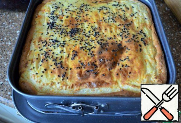 Bake the pie for 15 minutes at 200 degrees,
then cover with foil and bake for another 25 minutes at 180 degrees.
Remove the foil and brown under the grill for 5 minutes.