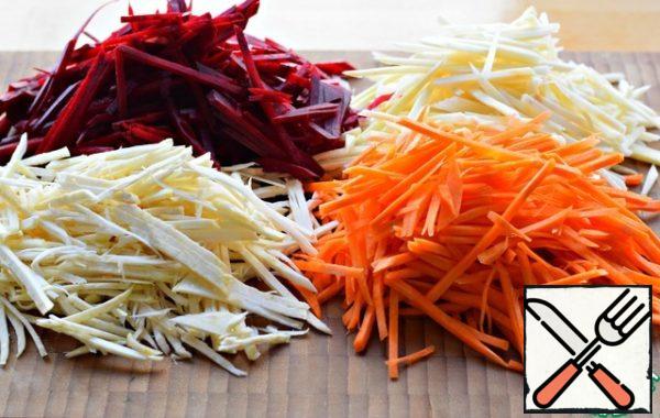 Cut beets, carrots, celery and parsnips into thin strips or grate on a coarse grater for Korean salads.
