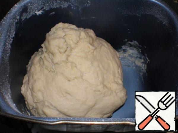 To prepare the dough, gradually mix all the ingredients - I did it in a bread maker-turned out a homogeneous puffy dough. give 30 minutes to infuse.