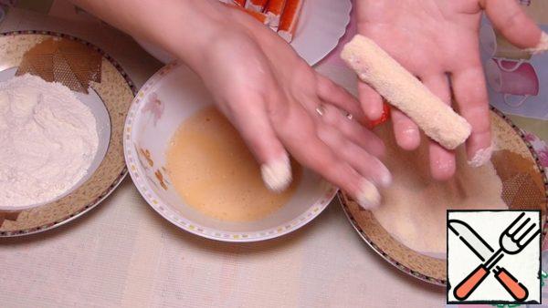 Now roll in semolina.
