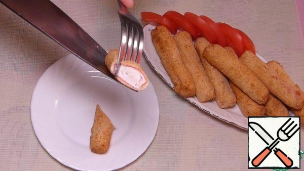 Serve hot. Crab sticks are juicy inside and crispy outside.