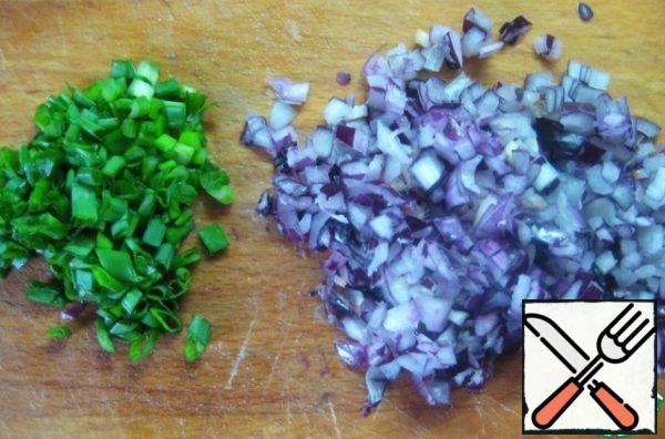 Finely chop the red and green onions.