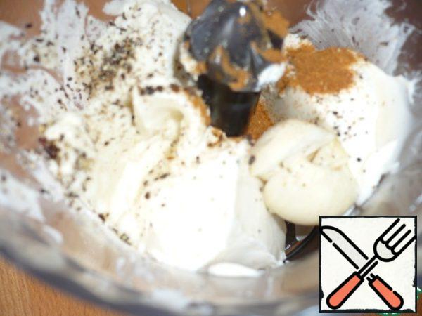 In a blender, whisk cottage cheese, olive oil, lemon juice, garlic, salt, cayenne pepper, ground black pepper.
