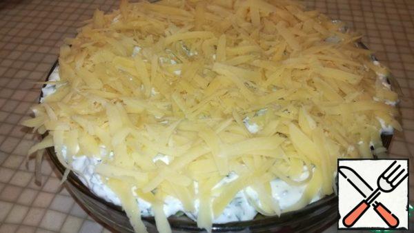 Grate the cheese on a coarse grater and sprinkle on top.