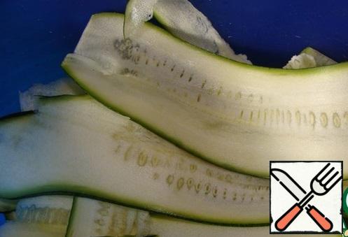 Zucchini cut into wide layers (and better on a grater),garlic is very finely cut.