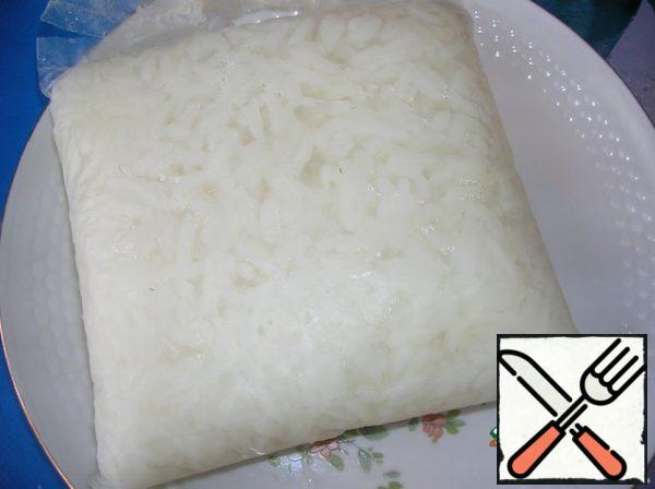 The rice is boiled in salted water until half cooked (about 10 minutes).
