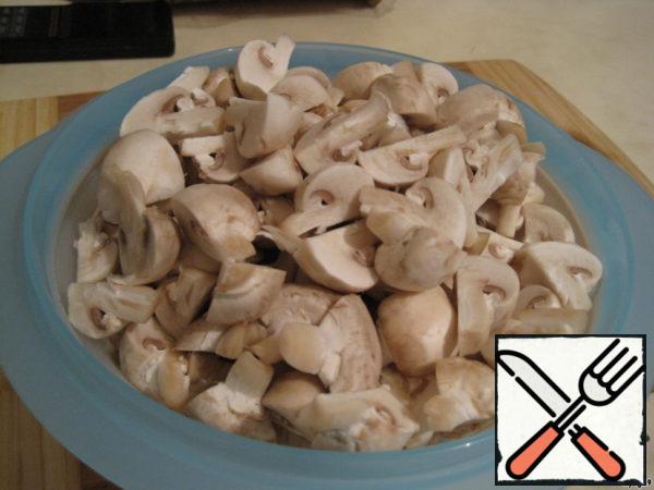 Cut them into 4 pieces and put them in a container, which we can seal at the end.
