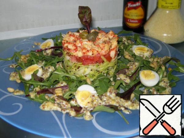 Before serving, hold the salad in the refrigerator, then remove the rings, decorate with herbs, eggs cut in half, capers and pour the Provencal seasoning, sprinkle with pine nuts.