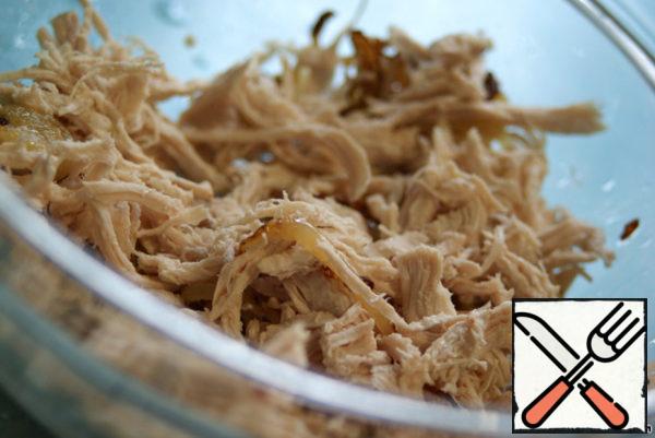 Boil the chicken and tear it into fibers with your hands (!). No cuts!
