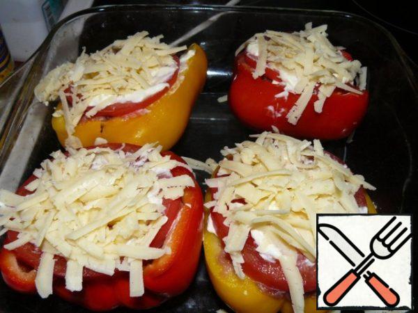 Sprinkle liberally with grated cheese.
