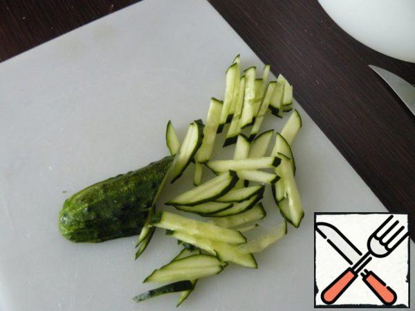 Cucumbers into strips.