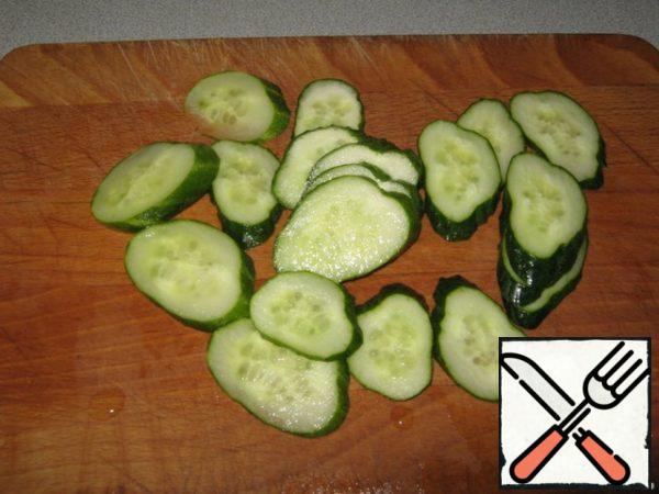 Slice the cucumber.
