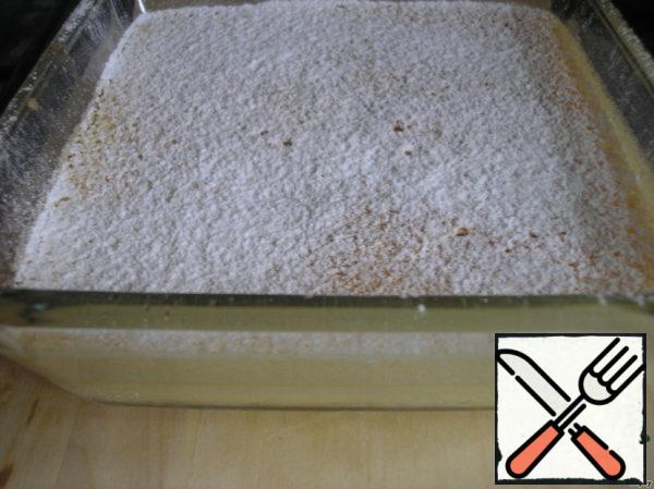 Sprinkle with powdered sugar. Let stand for 5 minutes before serving.Dessert turns of three layers: the bottom layer of dough, tender cream, and the top is foamy crust. This is surprising, given that we mixed all the ingredients in one container.
Bon appetit!