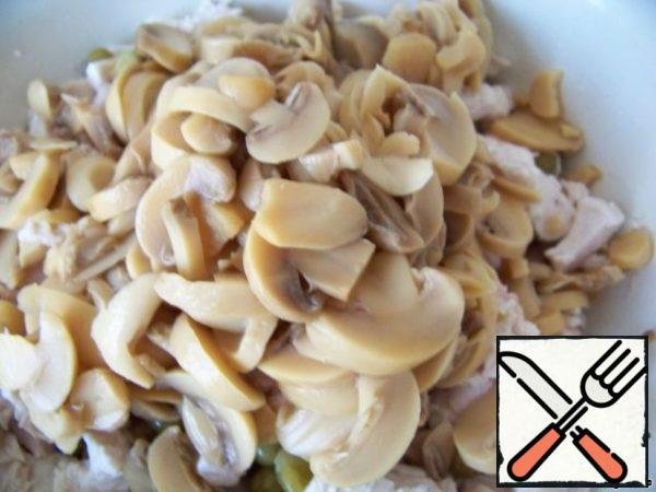Add the mushrooms.
