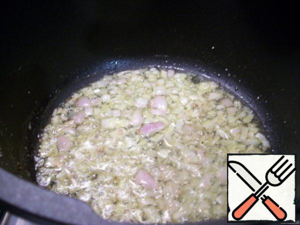 Chop the onion and fry it in the same oil.

