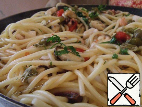 Mix with pasta, parsley, seafood and capers.
