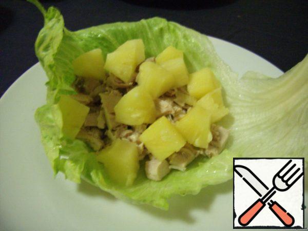 Pineapple cut into cubes. For chicken meat to put the pineapple.