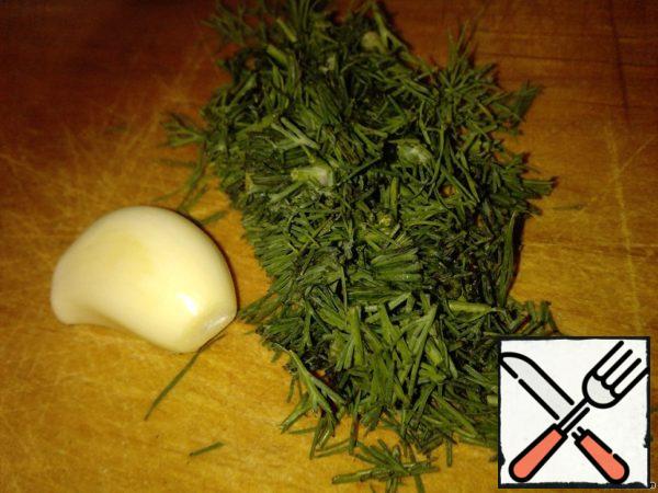 Prepare the herbs and garlic.
