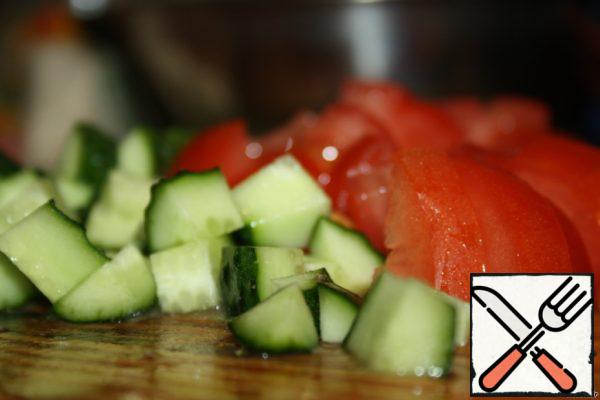 Tomatoes and cucumbers are also cut, not very finely.
