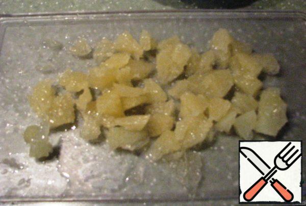 Carefully peel the grapefruit from the films and cut into cubes.
