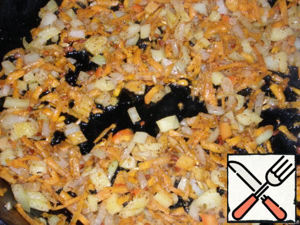 Boil the peas until soft. Grate the carrots on a coarse grater, cut the onion into cubes and fry everything in vegetable oil. Add the brisket.

