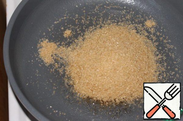 To make salted caramel, heat the sugar in a frying pan until it completely dissolves.
