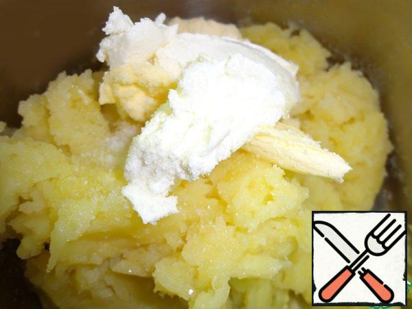 Add cream cheese, salt, pepper and butter.