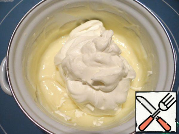 Add cream to the chilled pudding.