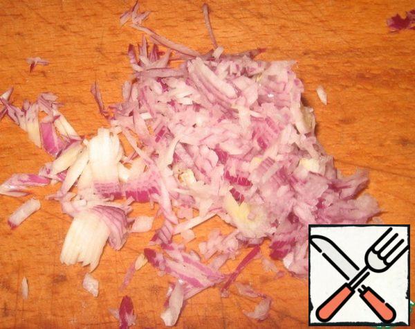 Red onion finely cut and put in a deep Cup.