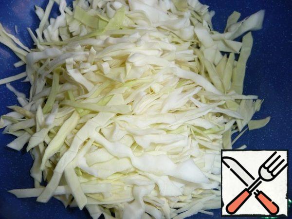 Finely chop the cabbage. Lightly dented.