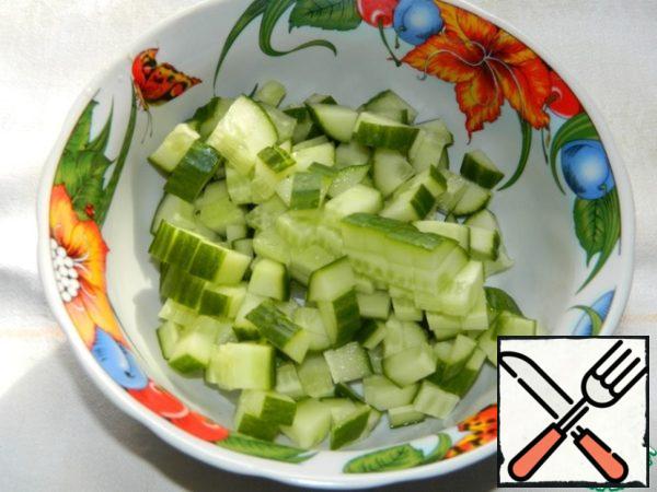 Cut cucumber. 