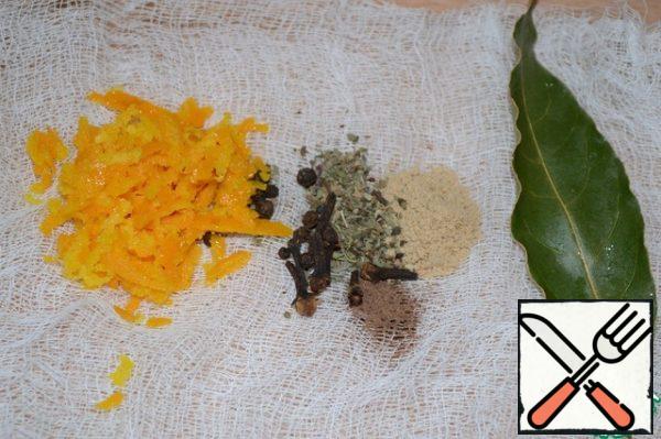While the broth is cooking, we will prepare one of the most important components of bouillabaisse - the so-called "bouquet of side dishes". Put grated orange zest, bay leaf, ground black pepper, basil, nutmeg, ground ginger, cloves in a bag made of natural fabric or gauze (I took a bandage). Being in the bag, the seasonings will not get into the broth, but will give the broth its unusual aroma and light taste.
