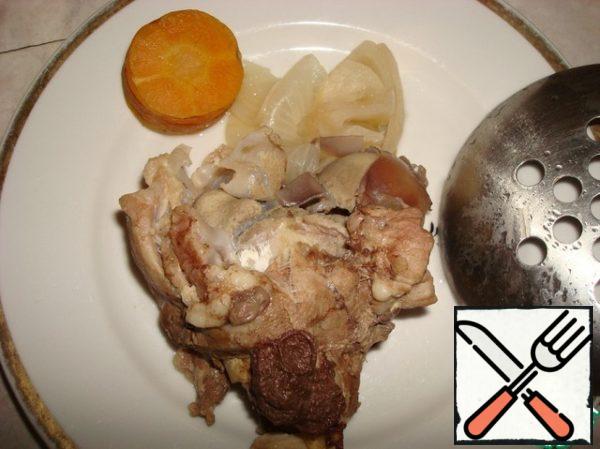 Open the lid and take out the bones along with the vegetables.

