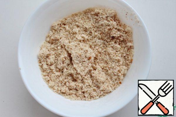 Grind the nuts into flour in a coffee grinder.
