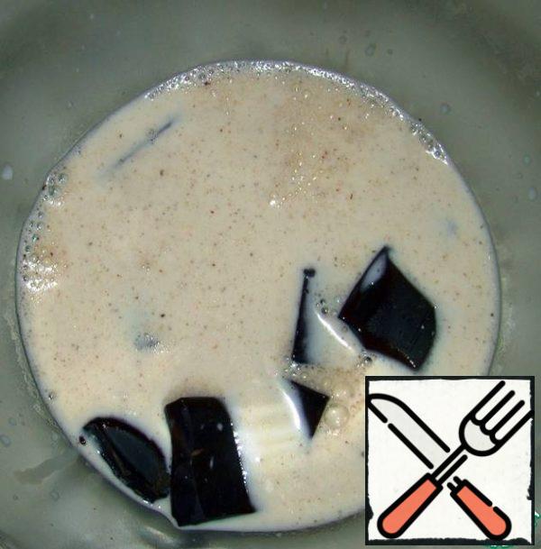 Pour some of the warmed milk into the chocolate and stir until smooth. The chocolate should completely melt!!!
