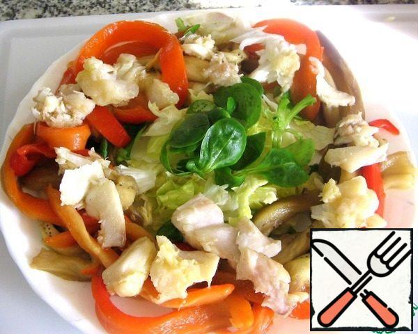 Put the cod on top, broken into small pieces.

